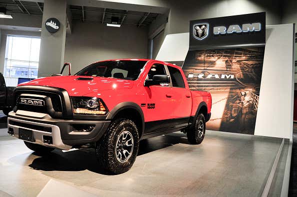A red RAM 1500 on display at the Washington Auto Show. 在华盛顿汽车展上展出的红色RAM 1500。