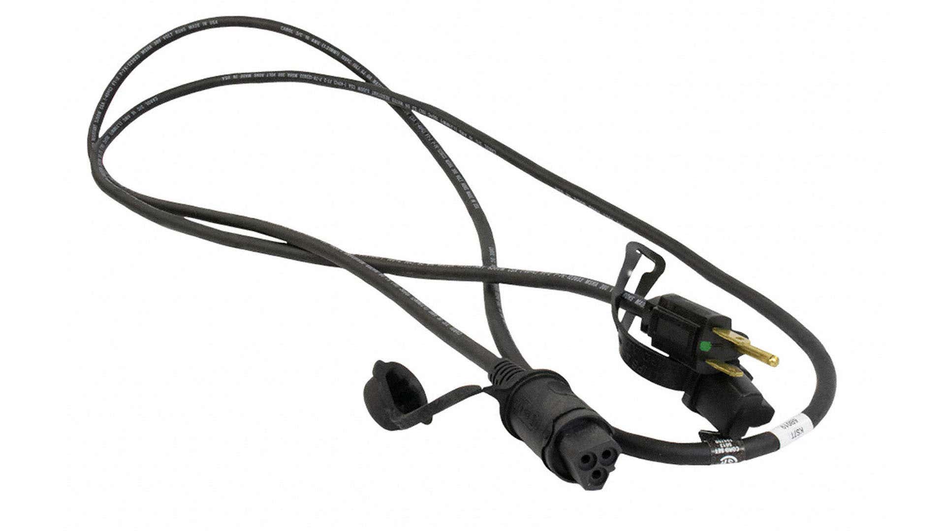 A Ford engine block heater. 福特发动机块加热器。