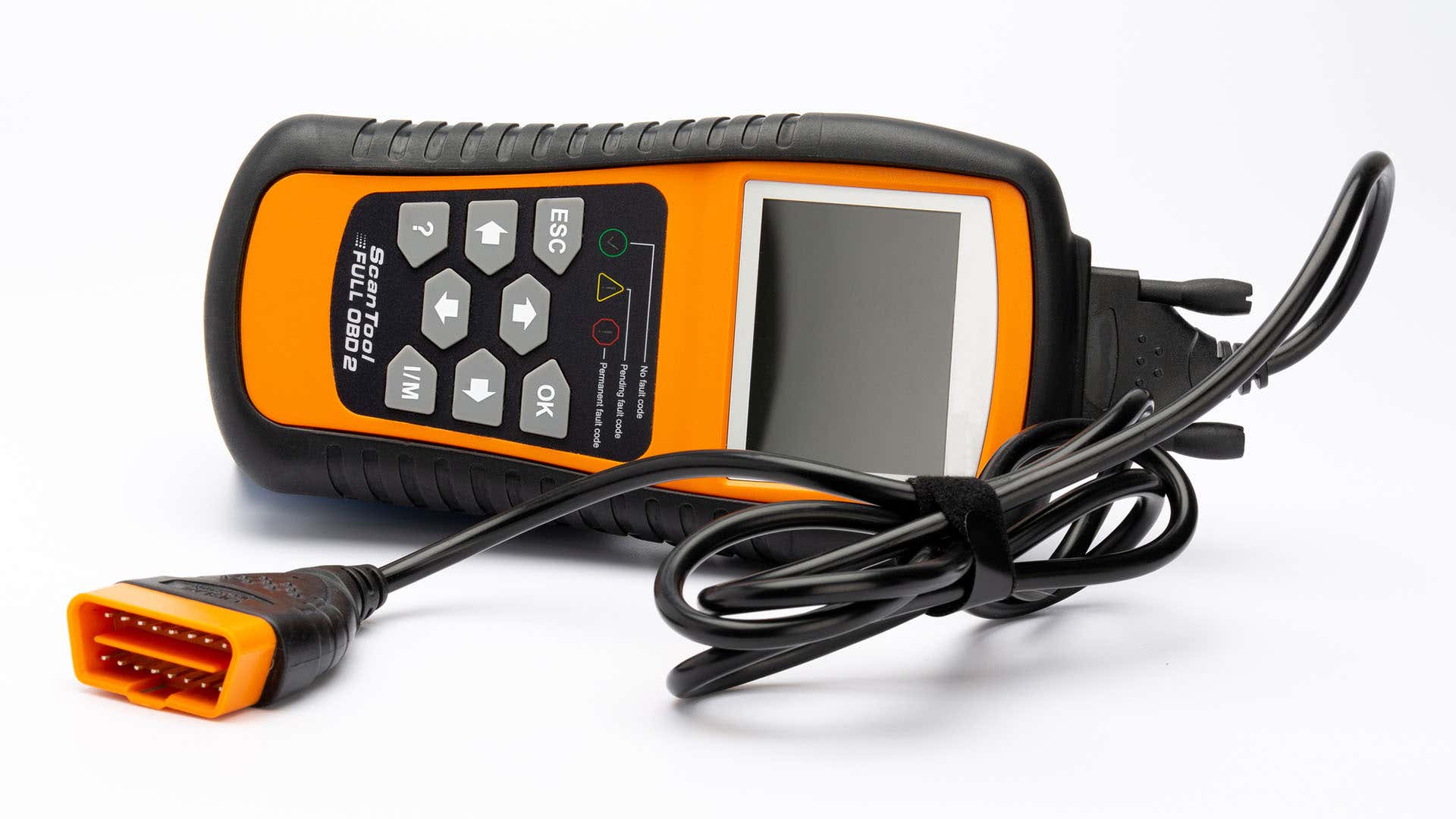 A black and orange OBD reader with the cord tied up. 黑色和橙色的OBD读卡器,绳子绑好。